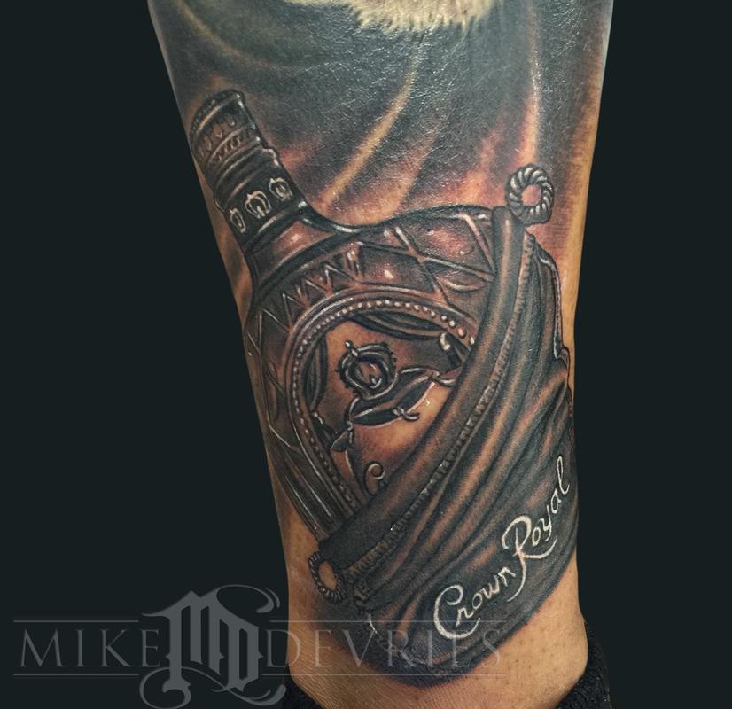 Crown Royal Bottle Tattoo by Mike DeVries TattooNOW